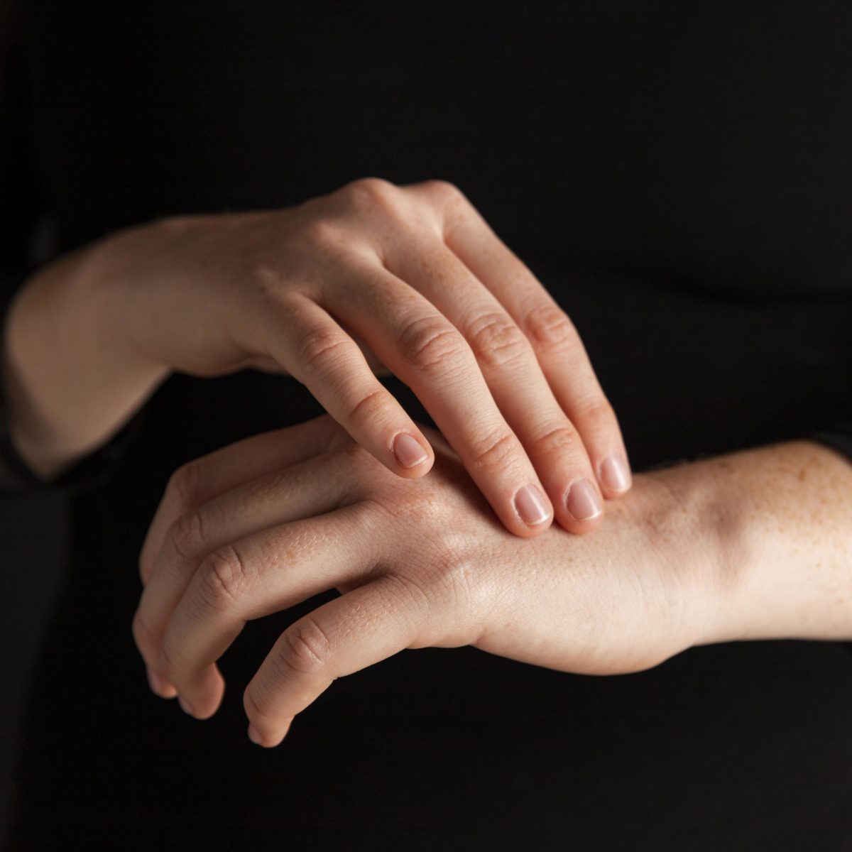 close-up-woman-touching-hands-1200x1200.jpg